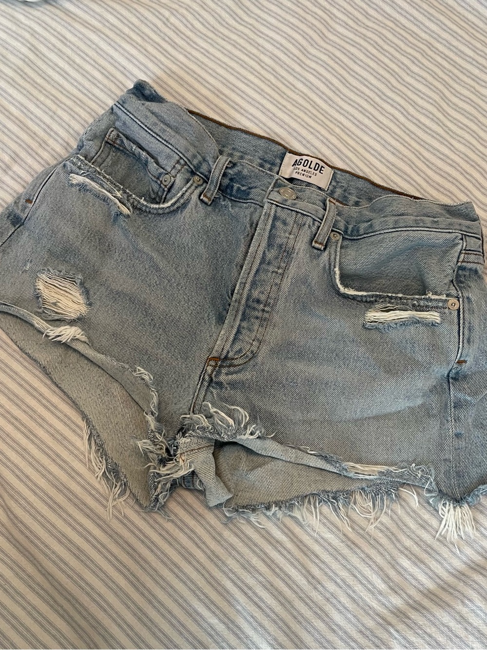 Agolde Washed Light Blue Distressed Denim Cutoff Shorts
